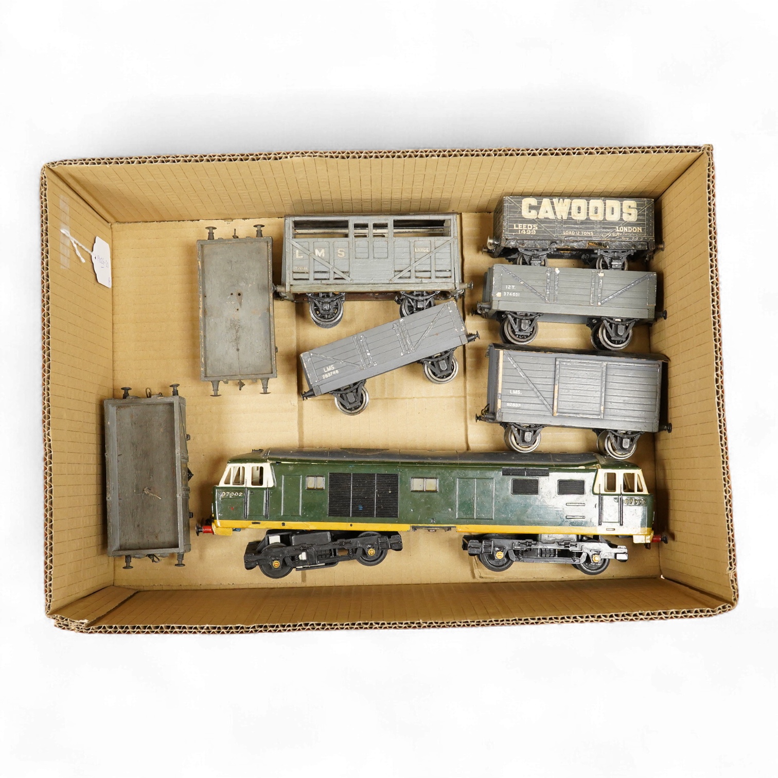 Seven 0 gauge coarse scale LMS and a private owner’s freight wagons, mainly of wood construction, together with the remains of a Tri-ang Big Big Train Class 35 Hymek diesel locomotive (8)